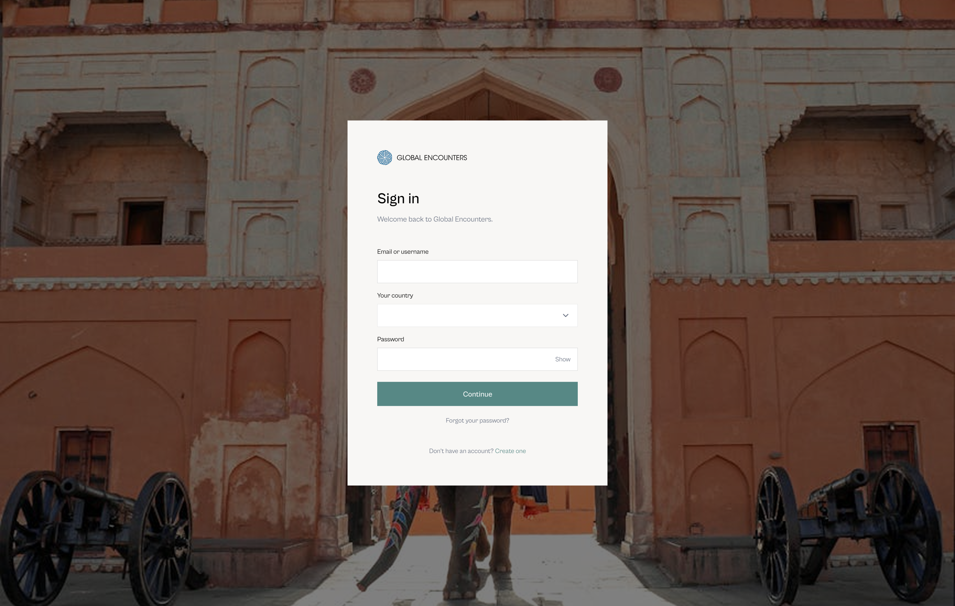 Redesigned Global Encounters login with full-bleed Amber Fort photography and a single white form container centred over the image